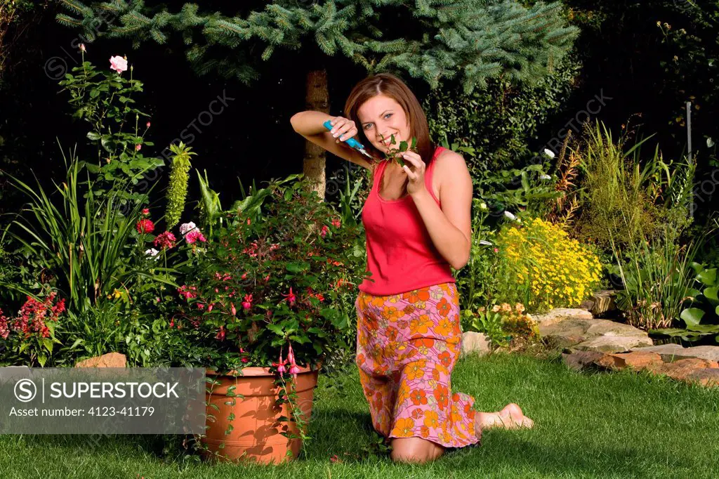 Woman working in garden.