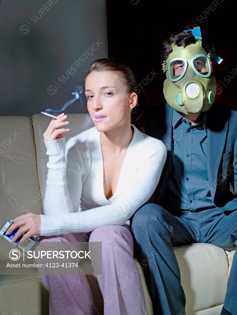 Man wearing a gas_mask and a woman smoking.