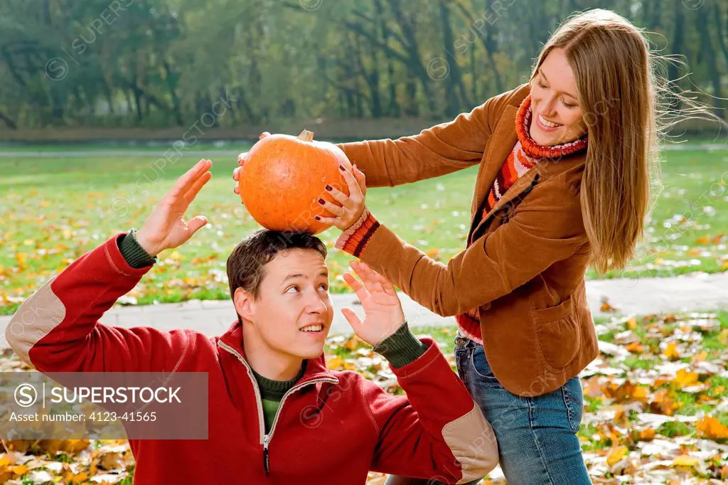 Young couple spending time togerther in park.