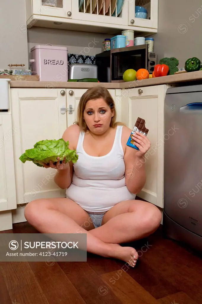 Plump girl in the kitchen