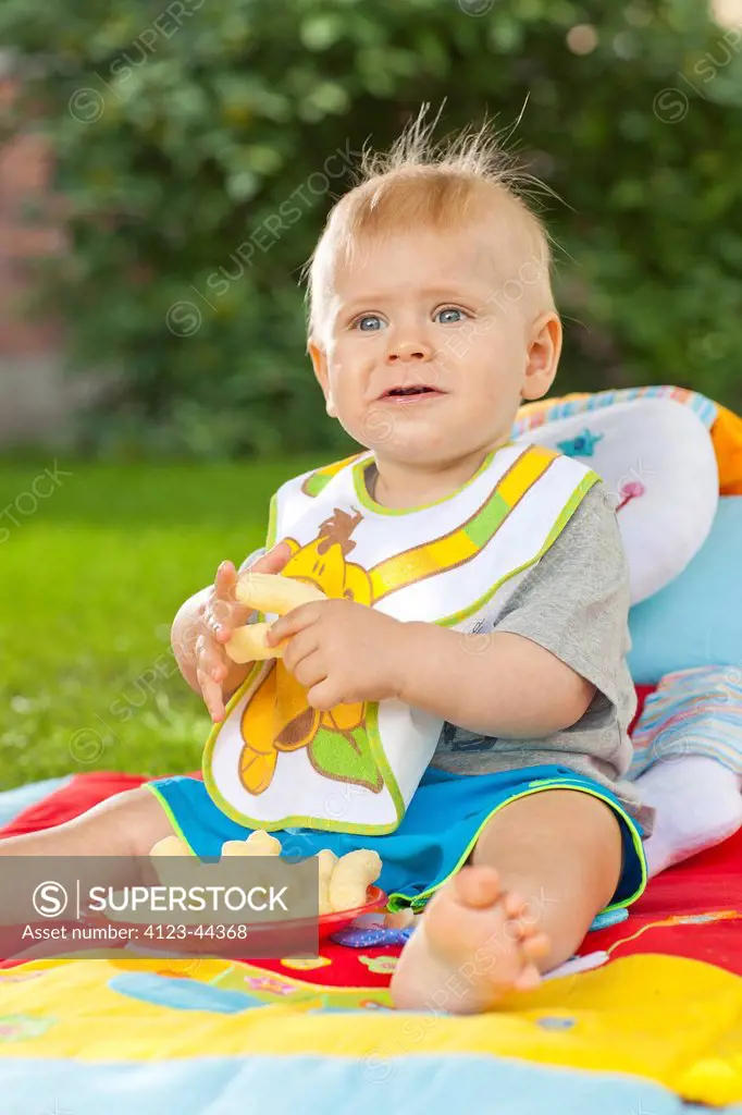 Baby boy at picnic.