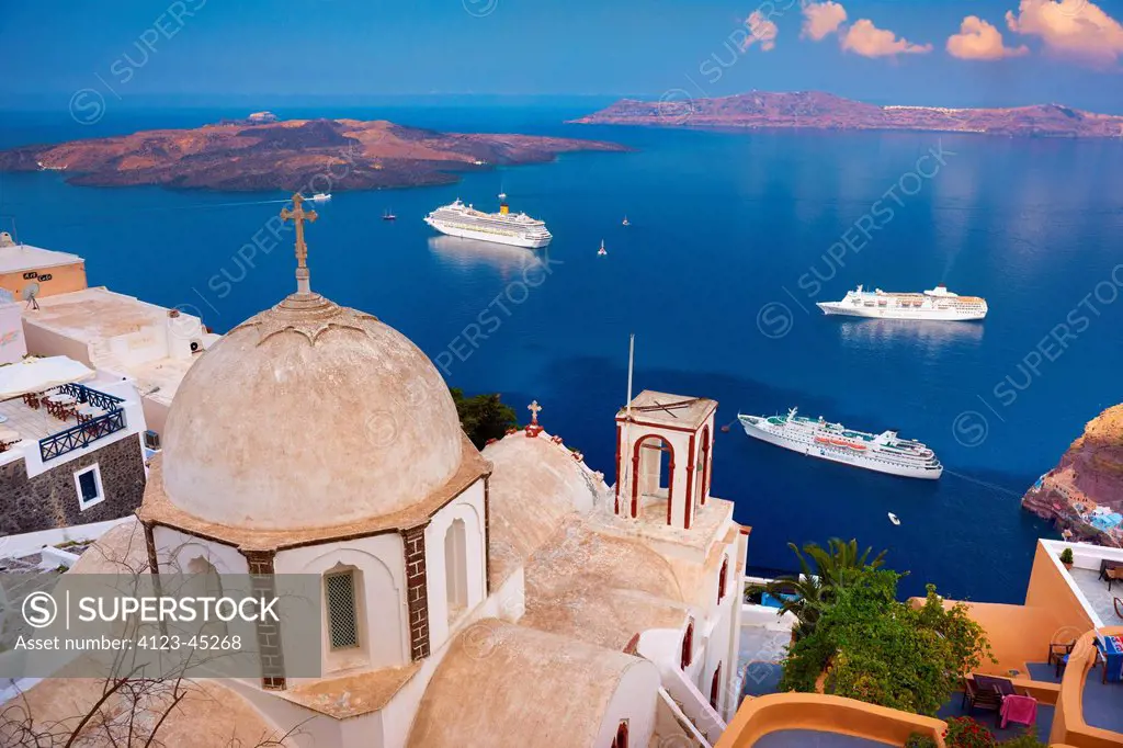 Greece, Santorini, greek island on the Cyclades archipelago. Byzantine church in Fira and view on the islands Nea Kameni, Thirasia.