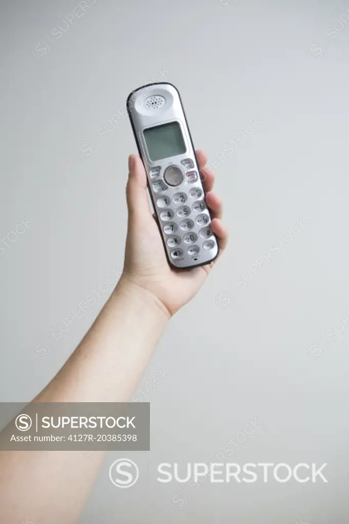 hand holding wireless phone
