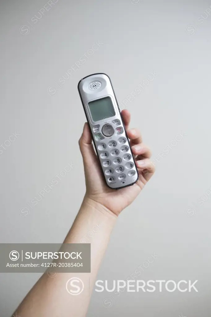 hand holding wireless phone