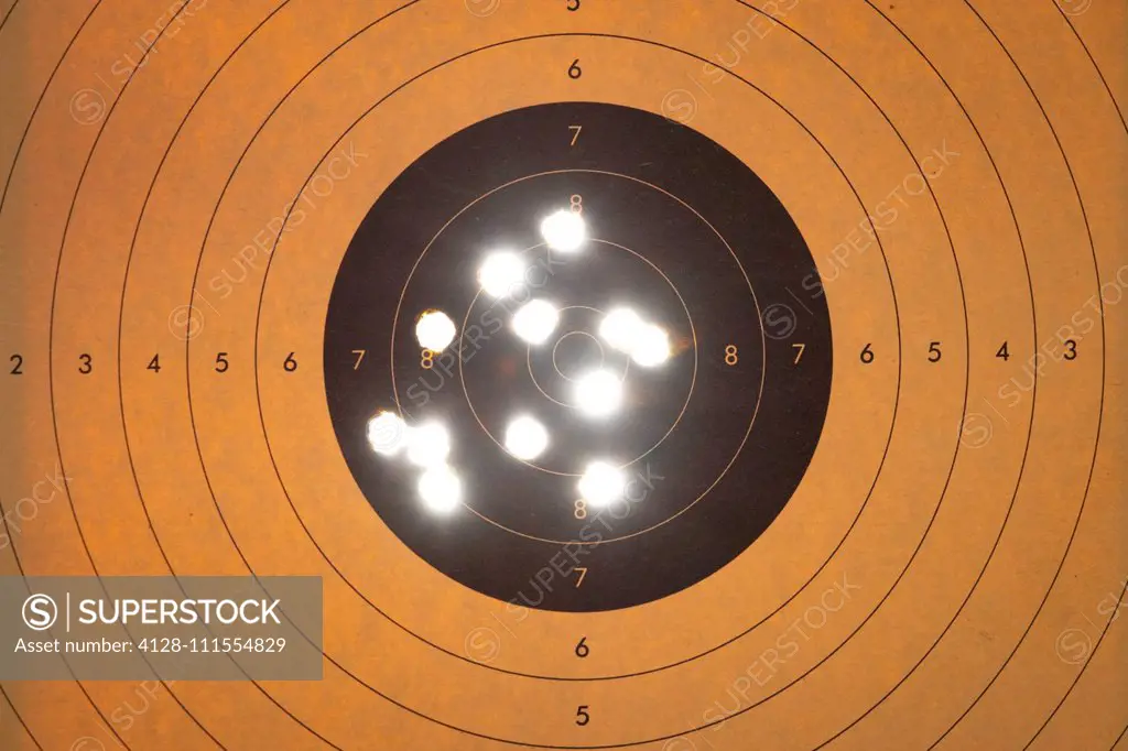 Shooting target with bullet holes