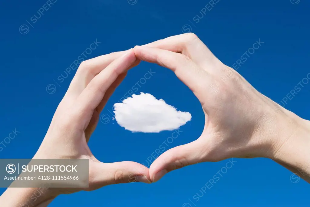 Cloud framed in hands
