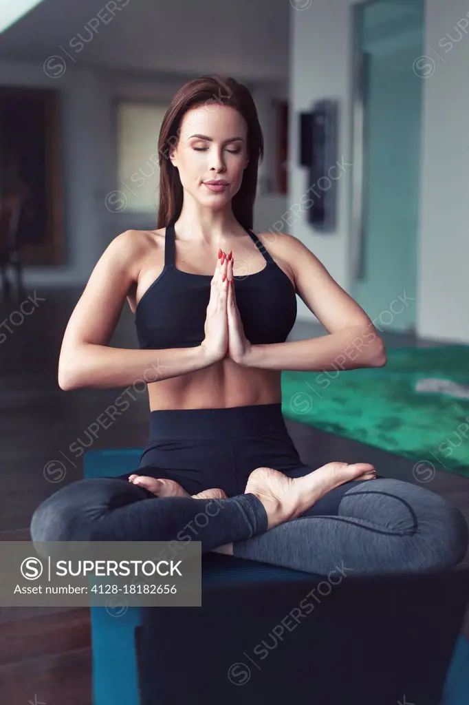Woman meditating during yoga