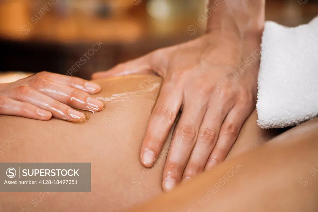 Alternative medicine ayurvedic body massage close-up