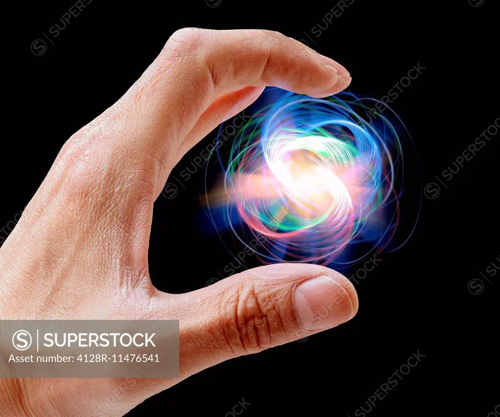 Person holding particle.