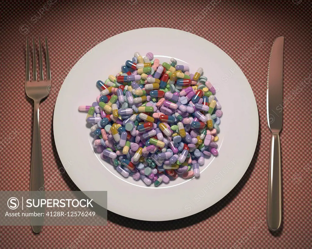 Plate covered in pills and capsules.