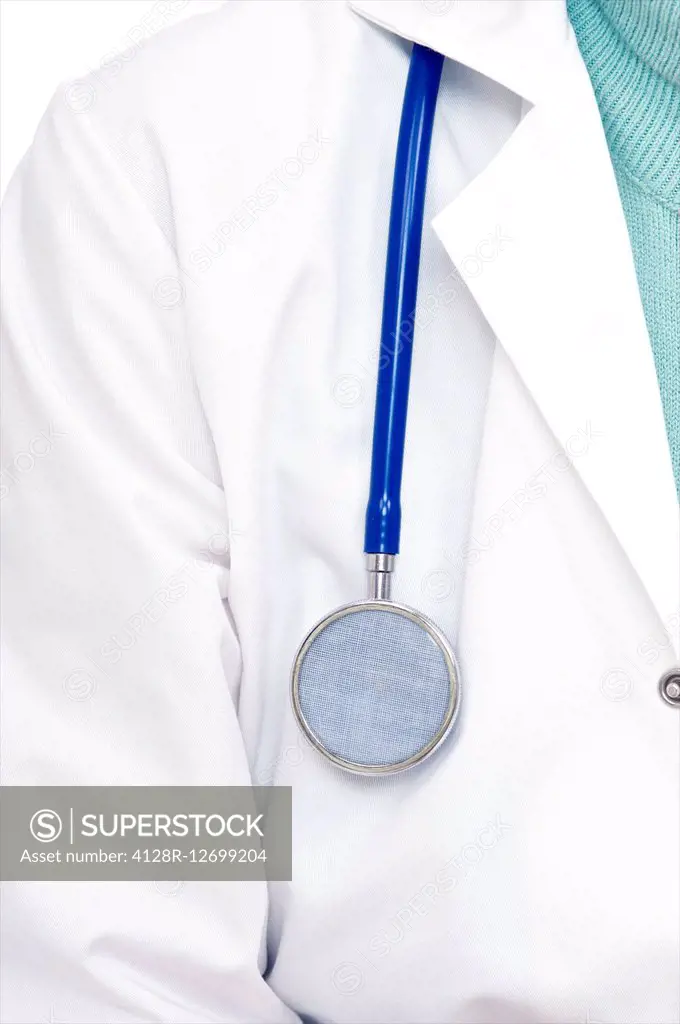MODEL RELEASED. Stethoscope and a laboratory coat, close up.