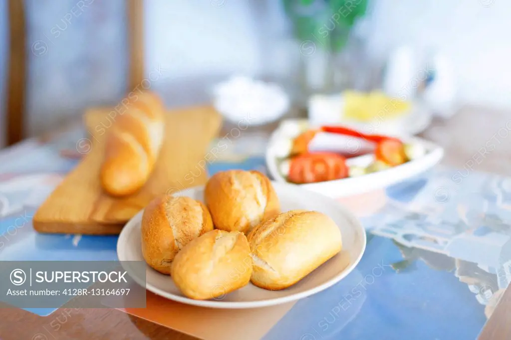 Fresh bread rolls on the table.