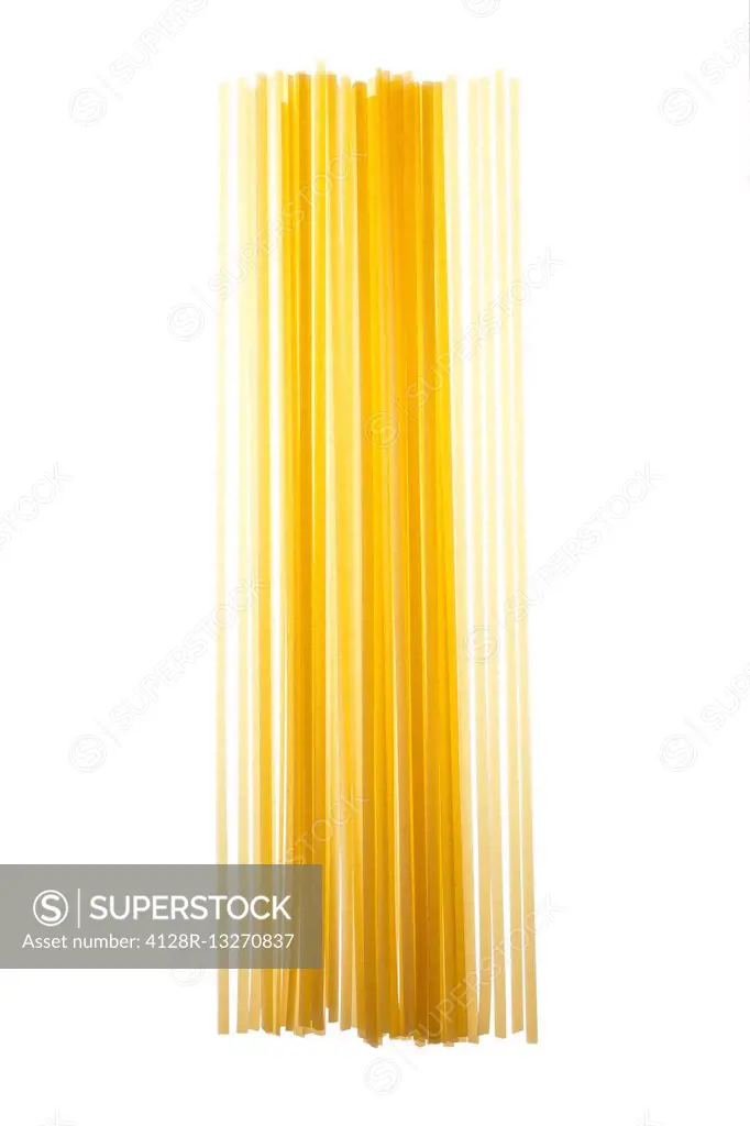 Dried pasta against a white background.