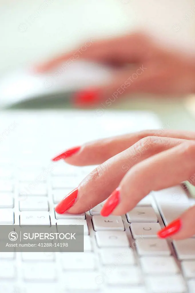Woman using a computer.