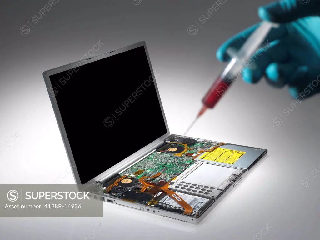 Computer virus. Conceptual image of a laptop being infected with a virus.