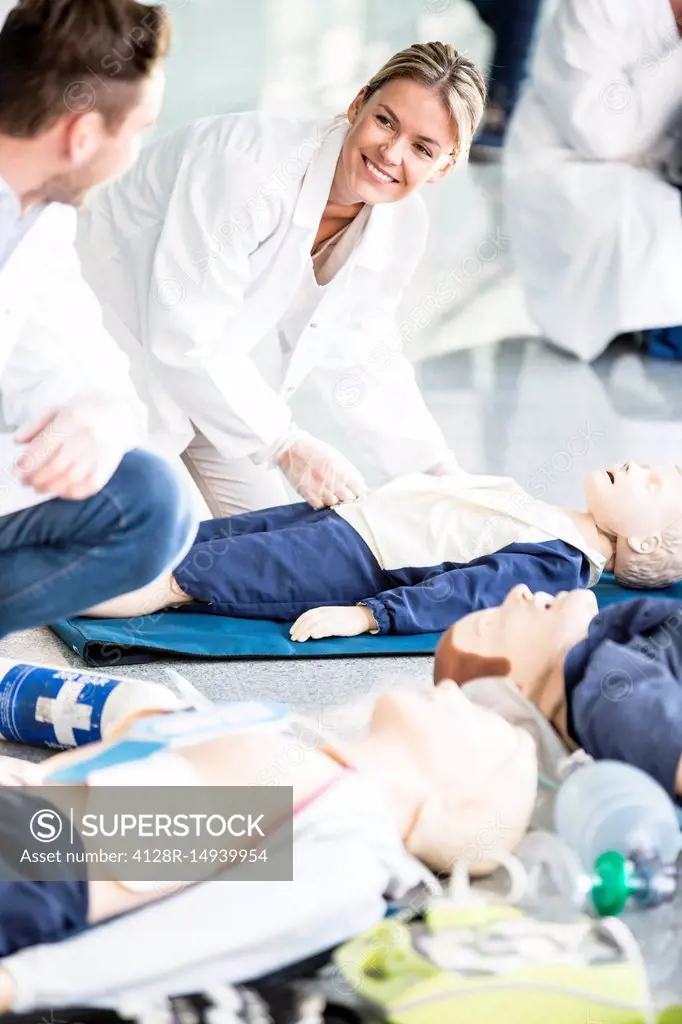 Doctors undertaking CPR training