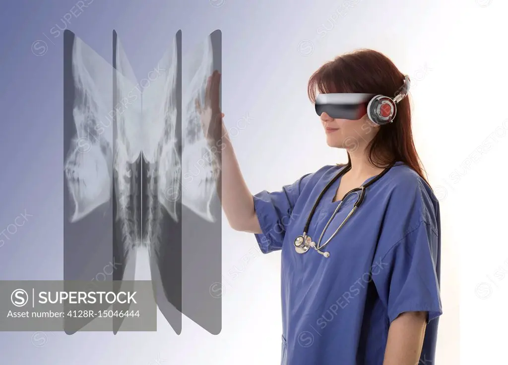Doctor wearing VR headset and examining X-rays