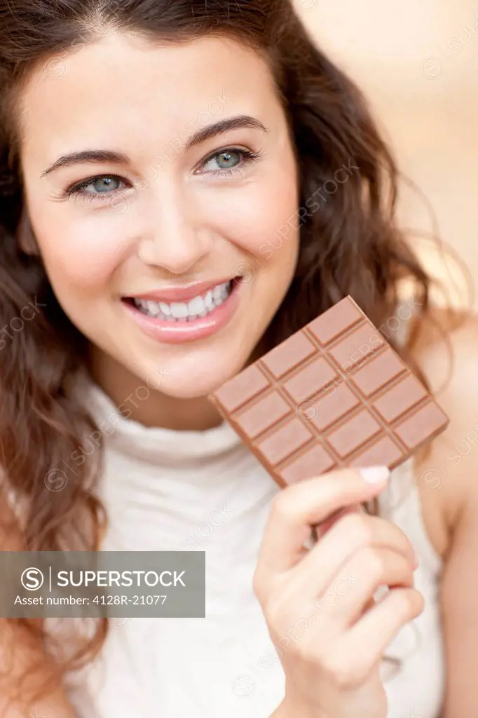 Woman eating chocolate