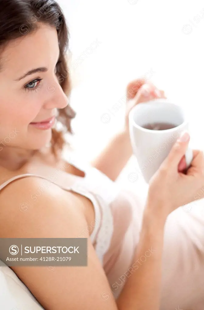Woman with a hot drink