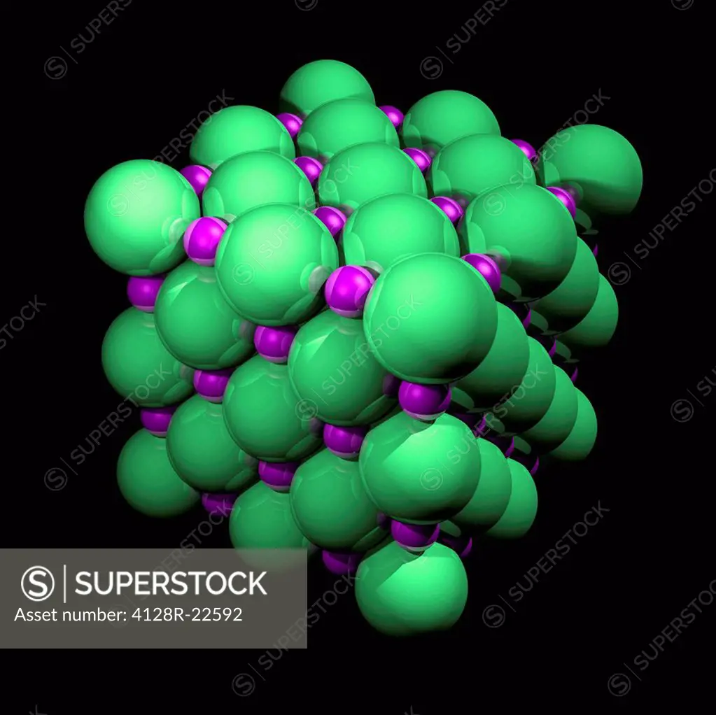 Sodium chloride. Computer artwork showing the crystal structure of sodium chloride common table salt. It comprises a regular arrangement of sodium pur...
