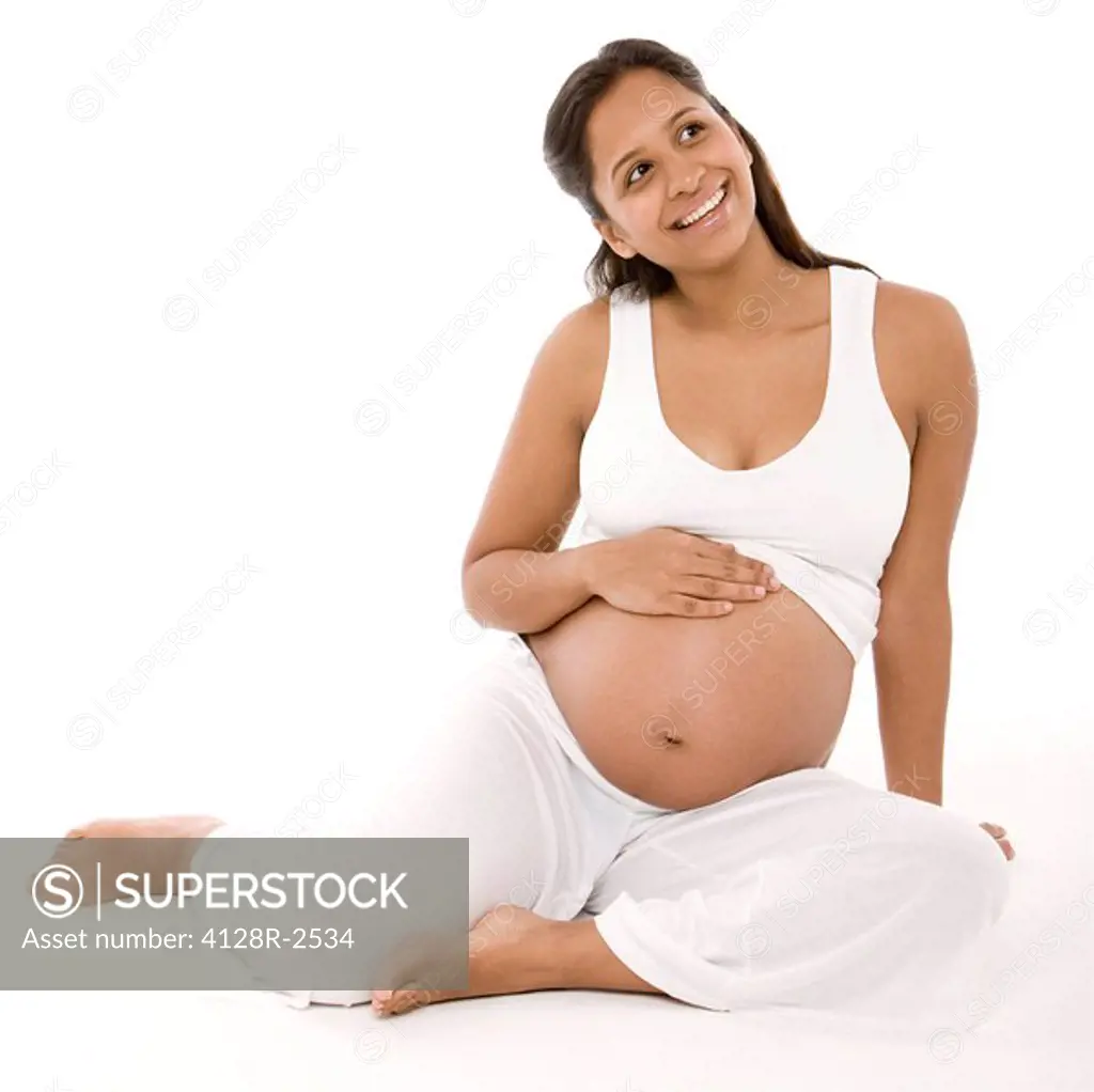 Pregnant woman. She is eight months pregnant.