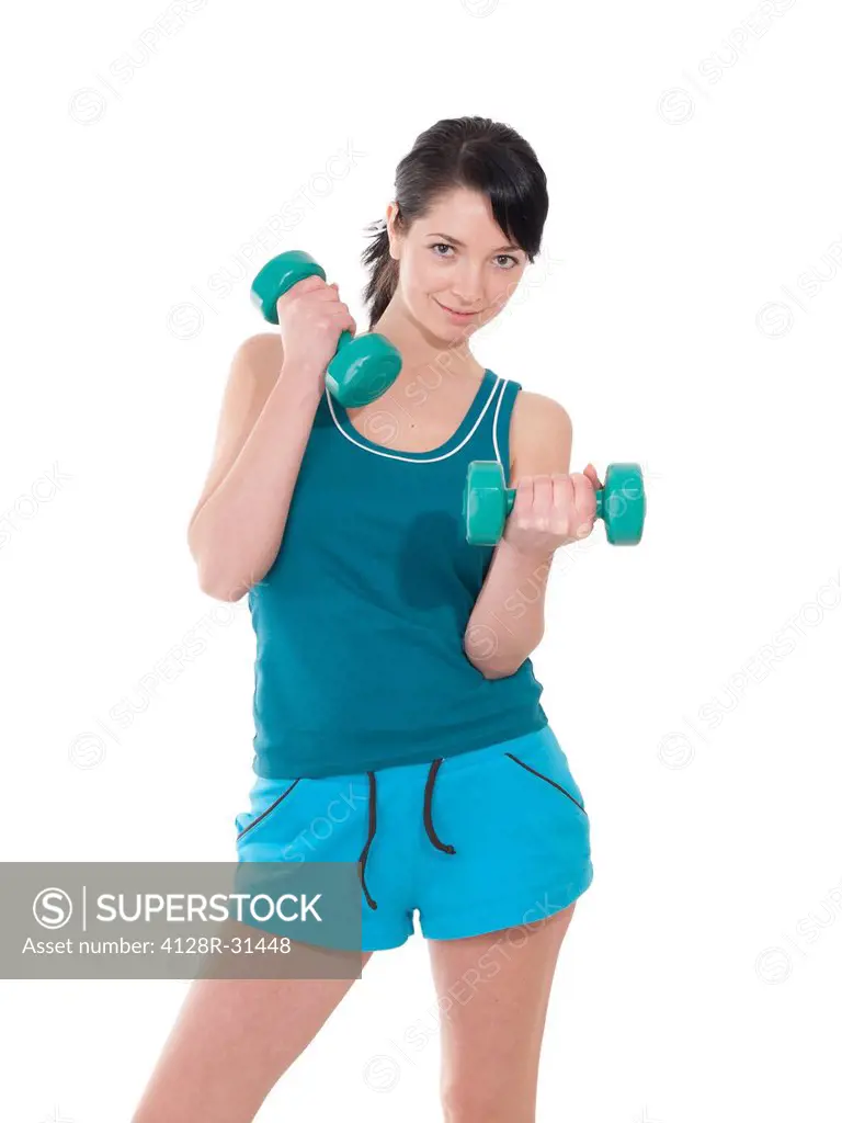 MODEL RELEASED. Woman weightlifting.