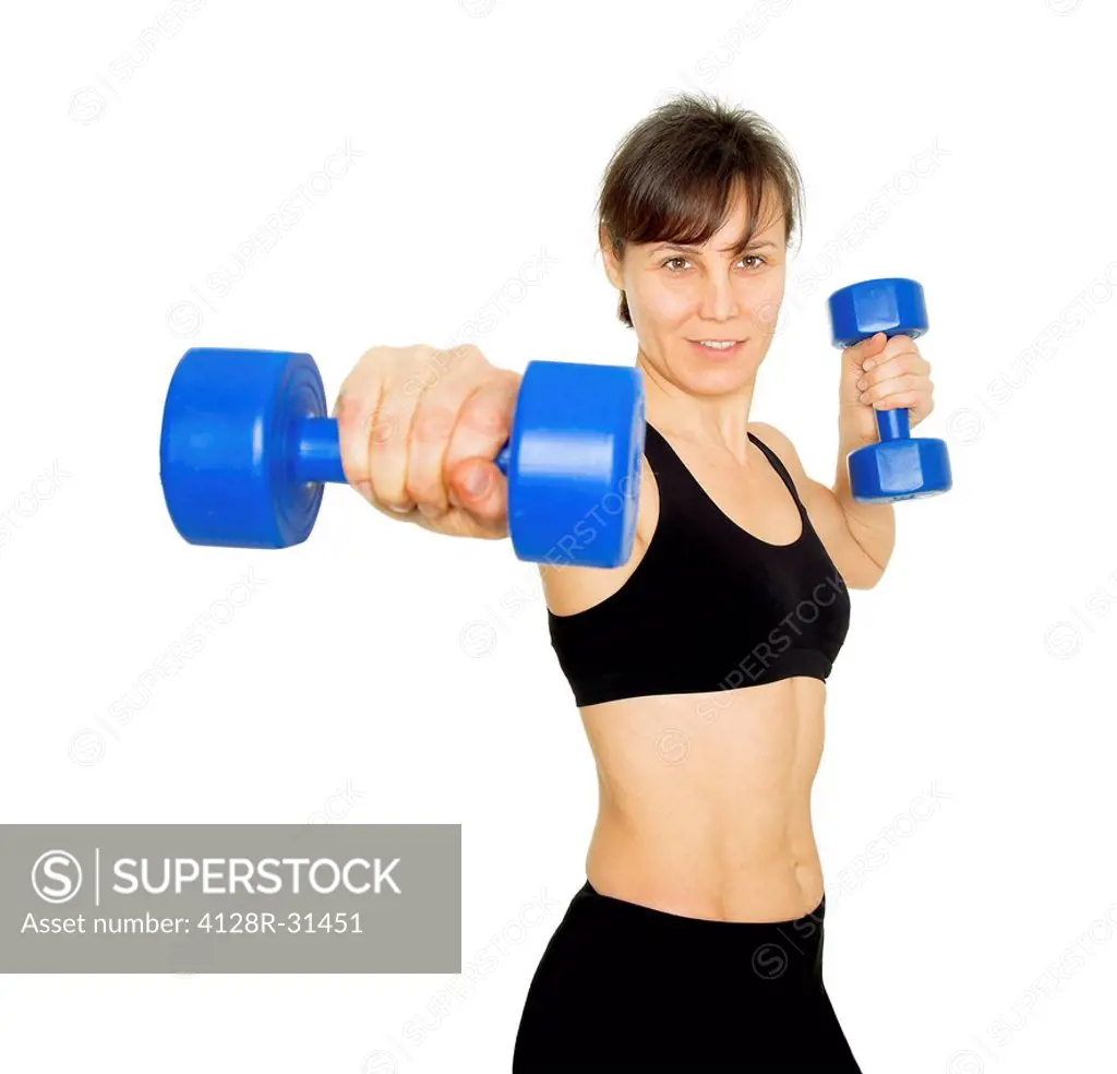 MODEL RELEASED. Woman weightlifting.
