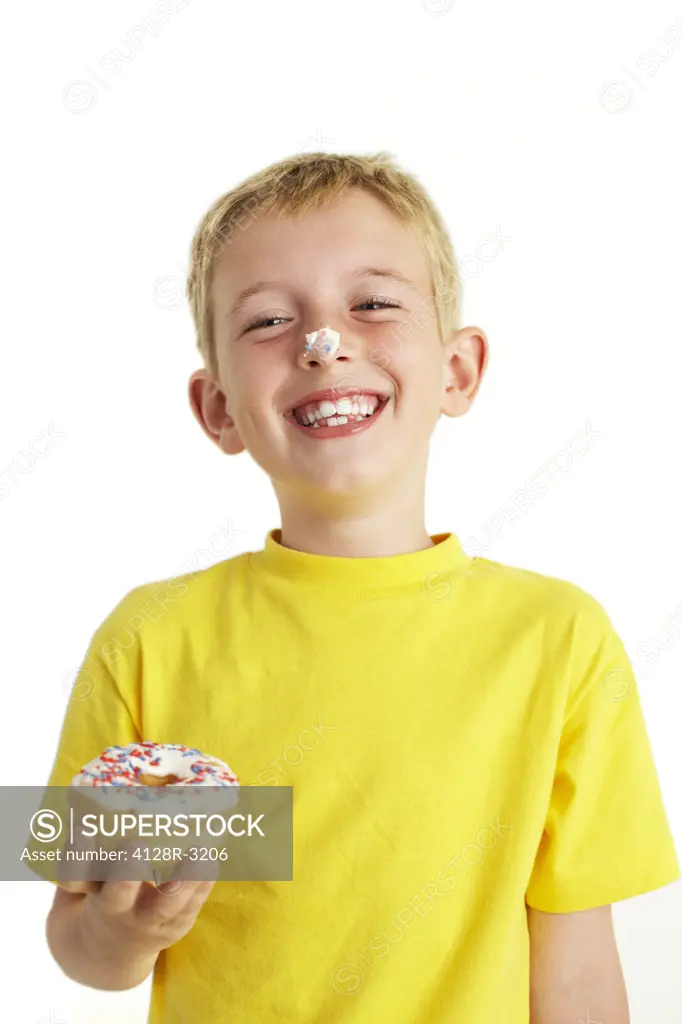 Boy eating a doughnut