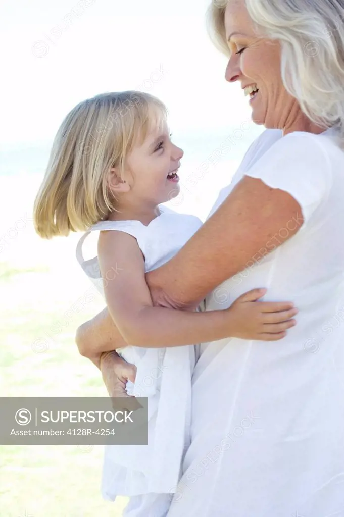 Grandmother embracing her granddaughter