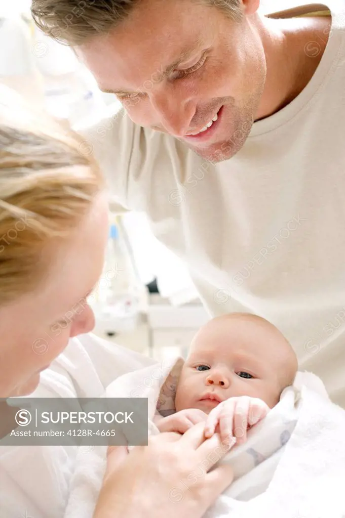 Parents and newborn baby