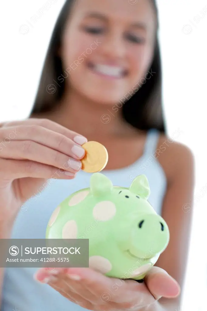Teenage girl saving money.
