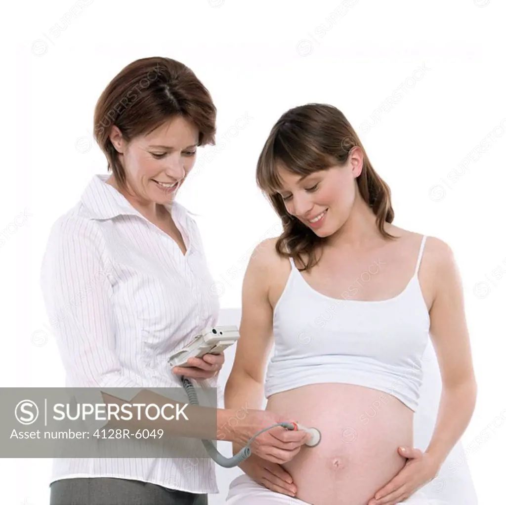 Obstetric ultrasound examination. The woman is 36 weeks pregnant.