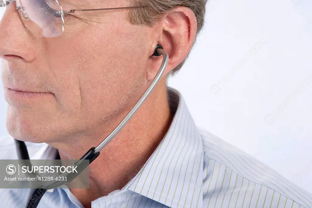 Doctor using a stethoscope