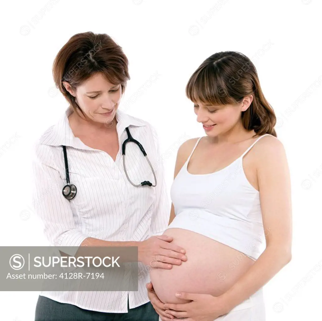 Obstetric examination. The woman is 36 weeks pregnant.