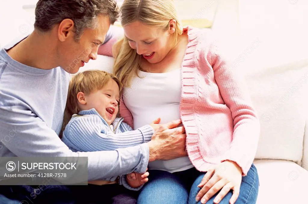 Pregnant woman and family