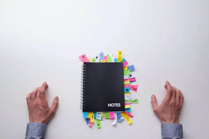 Notepad full of sticky notes