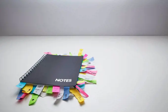 Notepad full of sticky notes