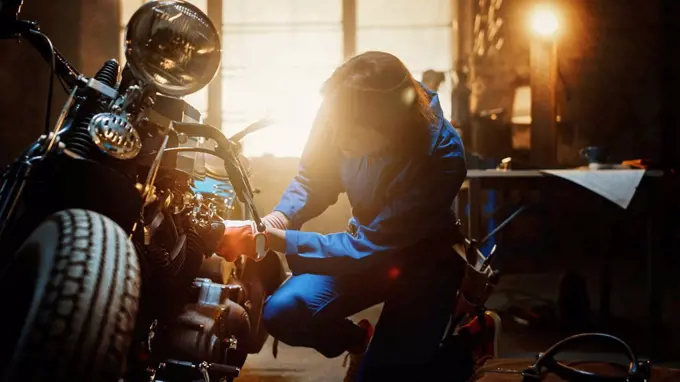 Mechanic working on a motorcycle