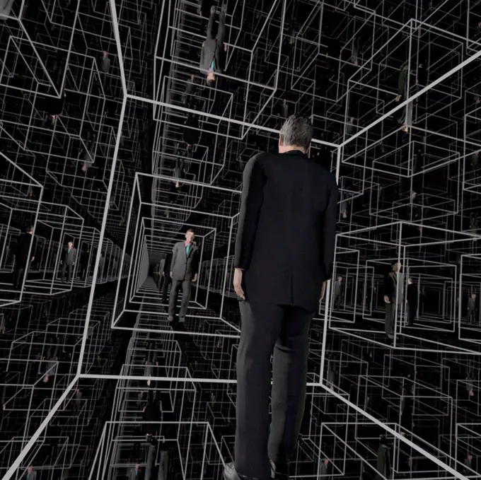 Identical men in a matrix-like structure of cubicles, seeming to be endless. Full CGI (including human figures)