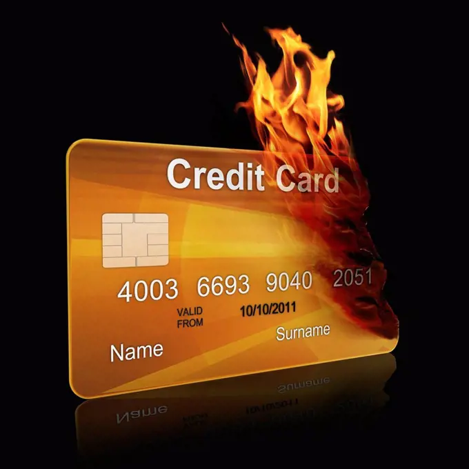 Gold credit card burning, illustration