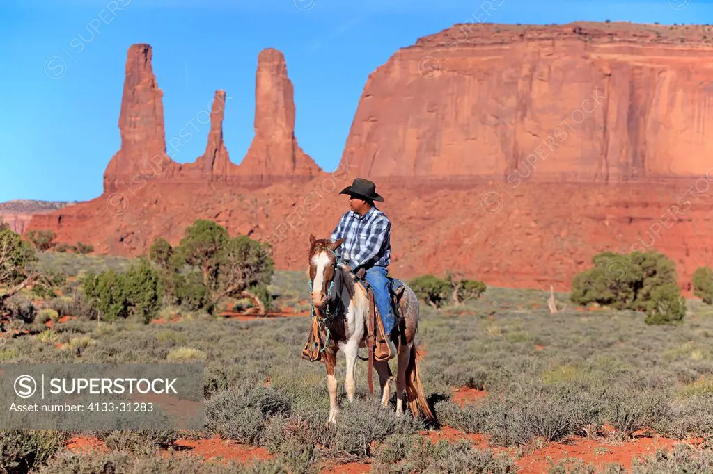Navajo Cowboy, Mustang, Equus caballus, Monument Valley, Utah, USA, Northamerica, Cowboy riding on Mustang