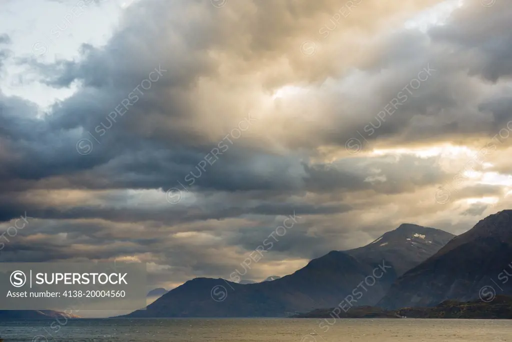Clouds and sun rays above Lyngen Fjord, North Norway, Lapland, September