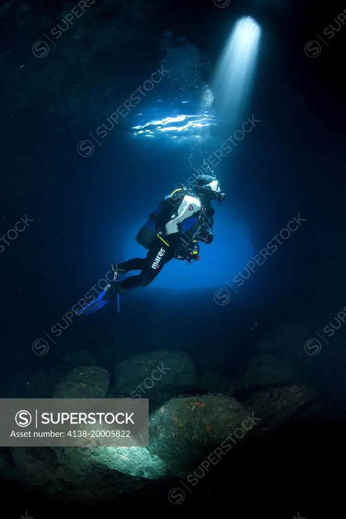 Scuba diver silhouette in the Green cave, Vis Island, Croatia, Adriatic Sea, Mediterranean