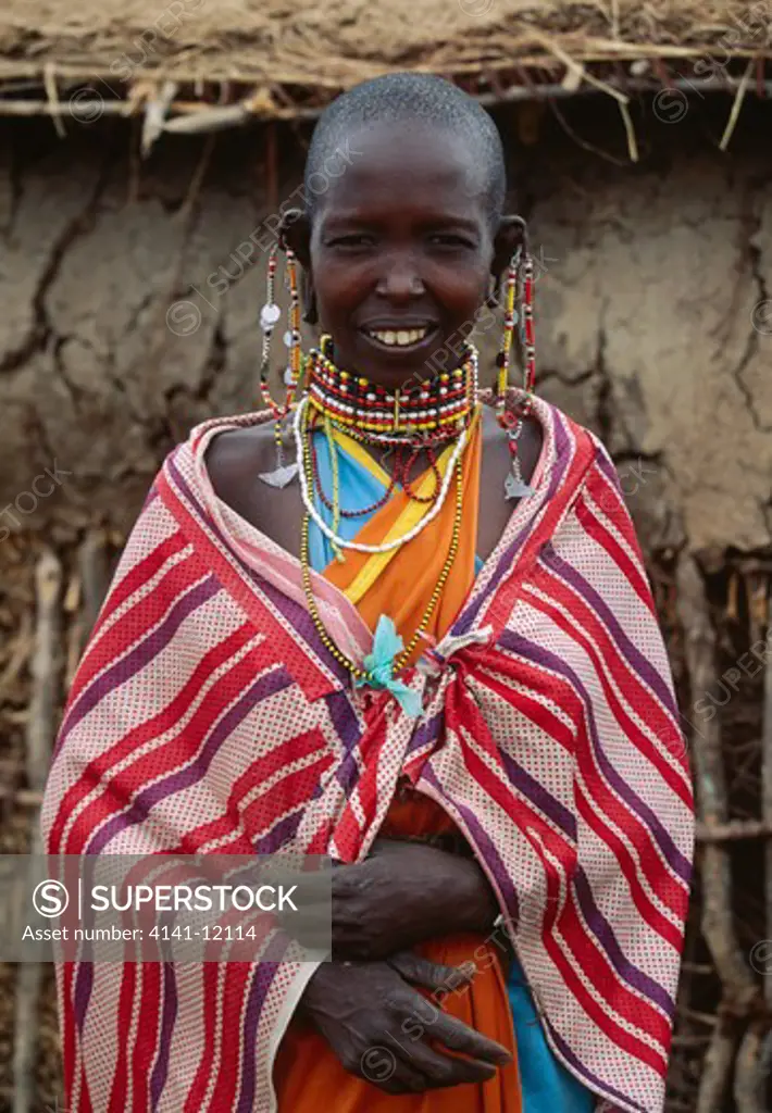 masai woman in native costume with earrings & necklaces masai mara, kenya, eastern africa