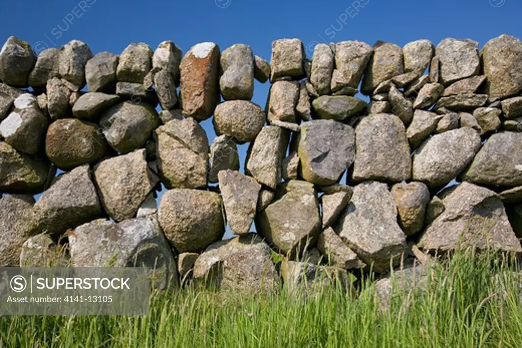dry stone wall made with granite boulders southern mull, argyll and bute, scotland