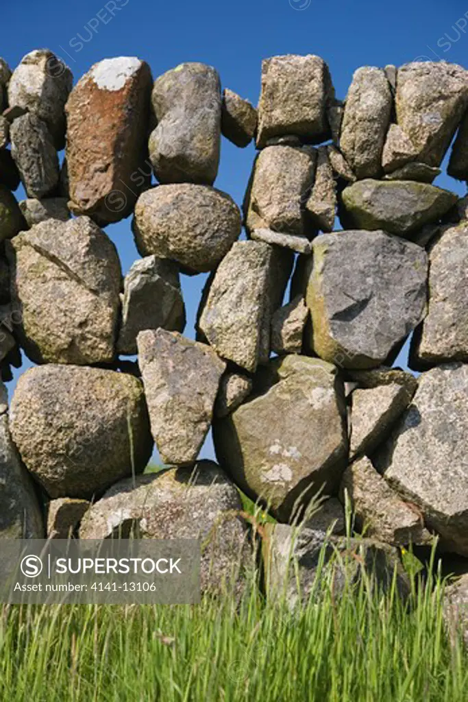 dry stone wall made with granite boulders southern mull, argyll and bute, scotland