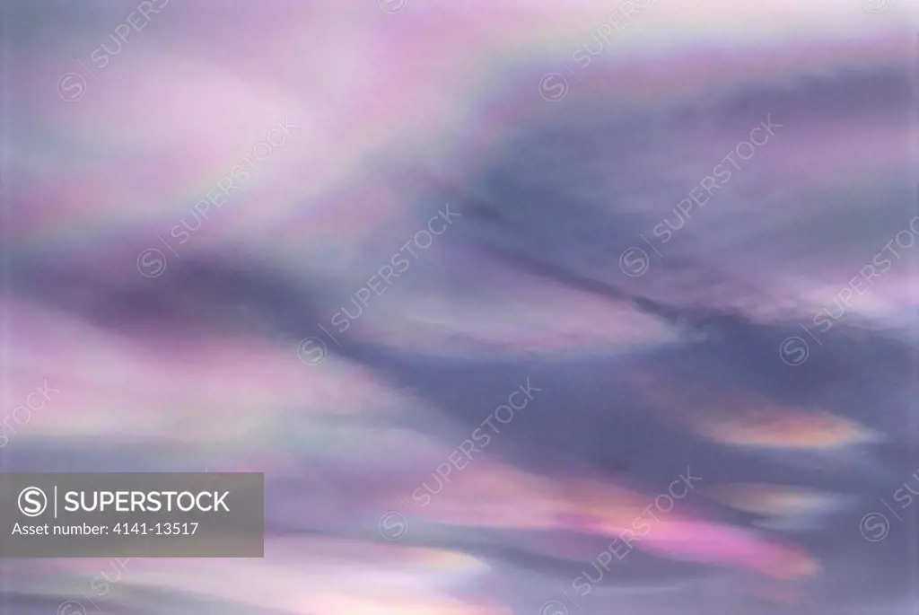 nacreous or mother of pearl clouds (altostratus) high cloud in late afternoon over aberdeen, scotland temperature below -50c