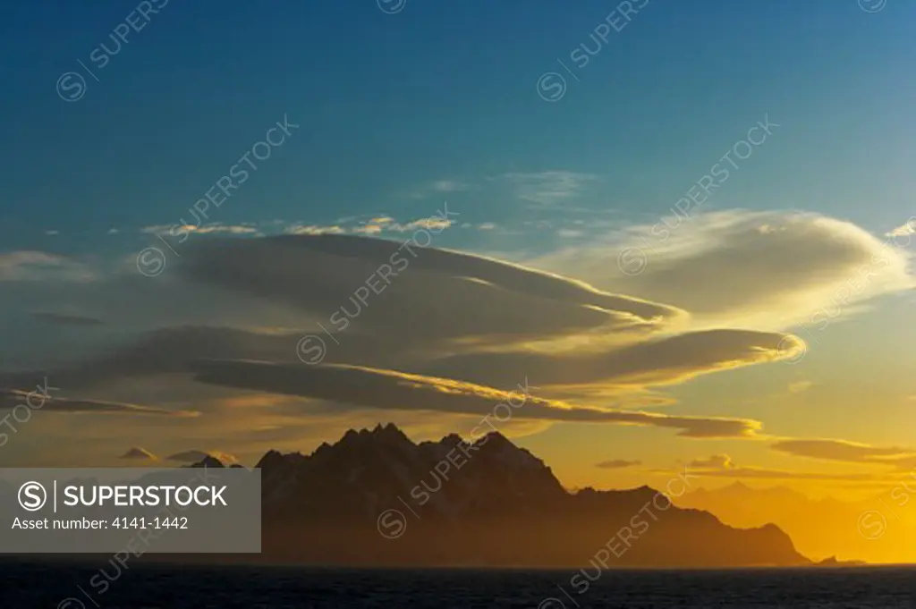 mountains and lenticularis clouds at sunrise, south georgia