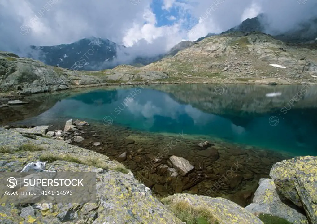 upper sternai alpine lake (2778m) stelvio national park, trentino, italy.