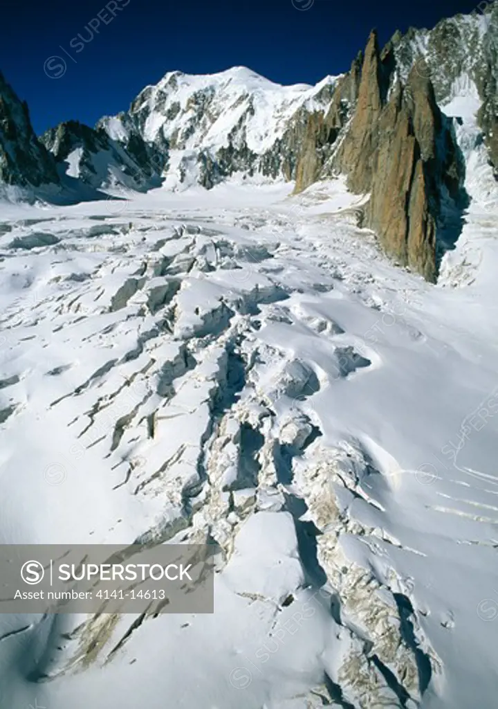 crevasses on glacier du geant mont blanc du tacul (4248m) in background. france.